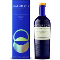 Blue Waterford Sheestown 1.2 Whisky bottle with gold cap, next to matching blue box with circular design.