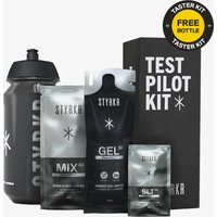 "STYRKR Test Pilot Kit with black water bottle, silver energy mix, gel, and salt sachets in sleek packaging"