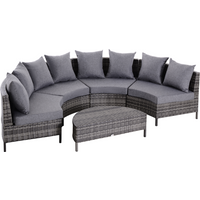 4-seater grey rattan half moon garden furniture set with cushions and matching oval coffee table.