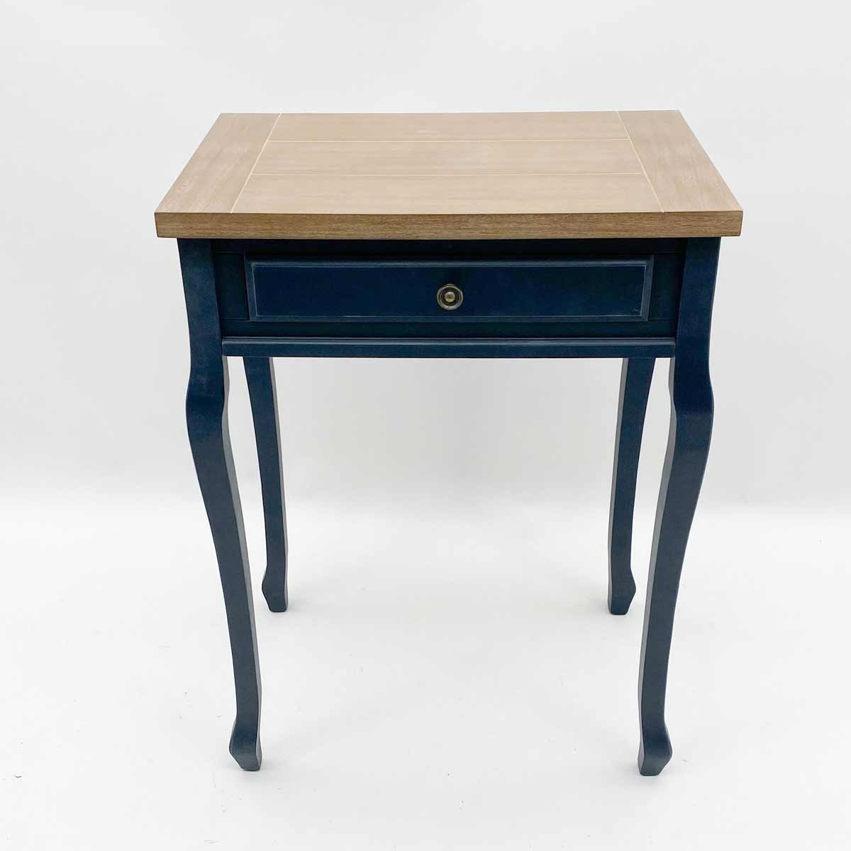 Wooden table with a light wood top and dark blue legs, featuring a single drawer with a round knob, measuring 40x60x78 cm.