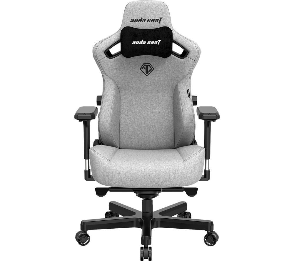 Premium gaming chair in ash gray fabric with a high back, adjustable armrests, and a black lumbar support pillow, featuring Anda Seat branding on the headrest.
