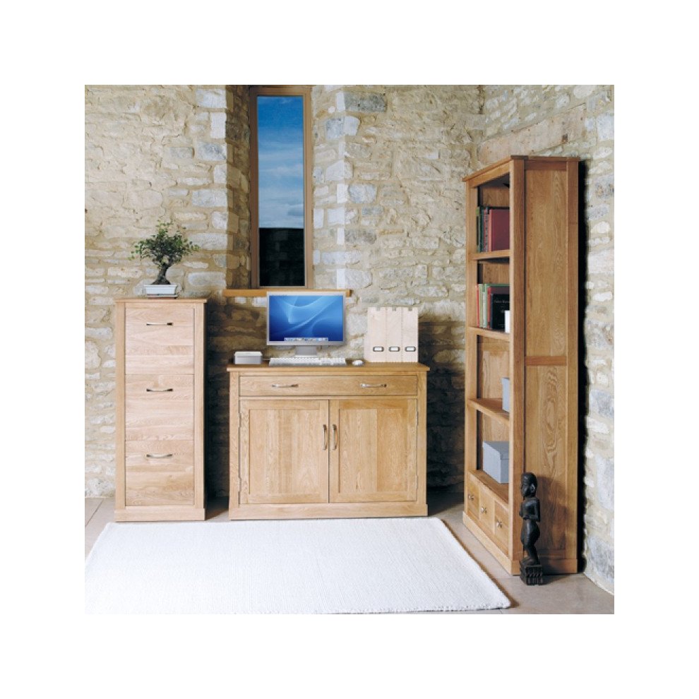 Brown oak hidden home office furniture set featuring a desk with storage cabinets, a tall bookshelf, and a computer setup, all set against a stone wall backdrop.