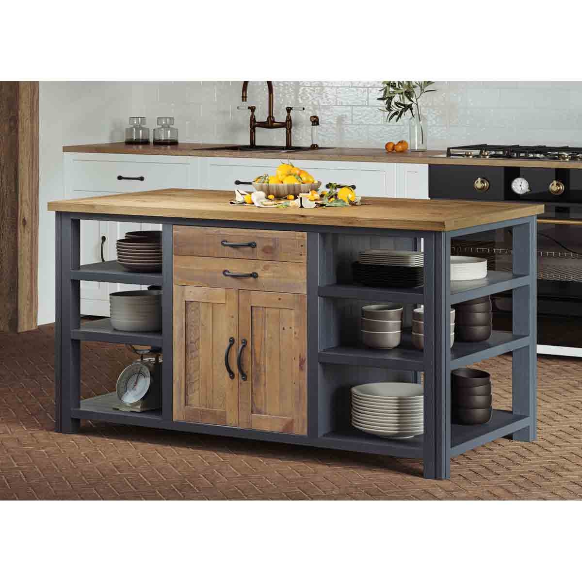 Blue kitchen island with a wooden top, featuring a central drawer, a cabinet with doors, and open shelves displaying plates and bowls, set against a modern kitchen backdrop.