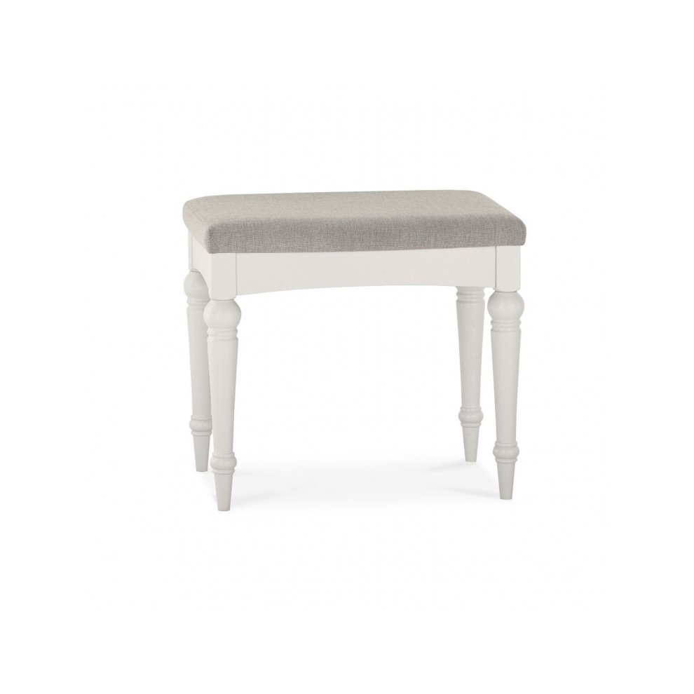 Soft grey stool featuring a pebble grey fabric upholstery and elegant white wooden legs with a classic design.
