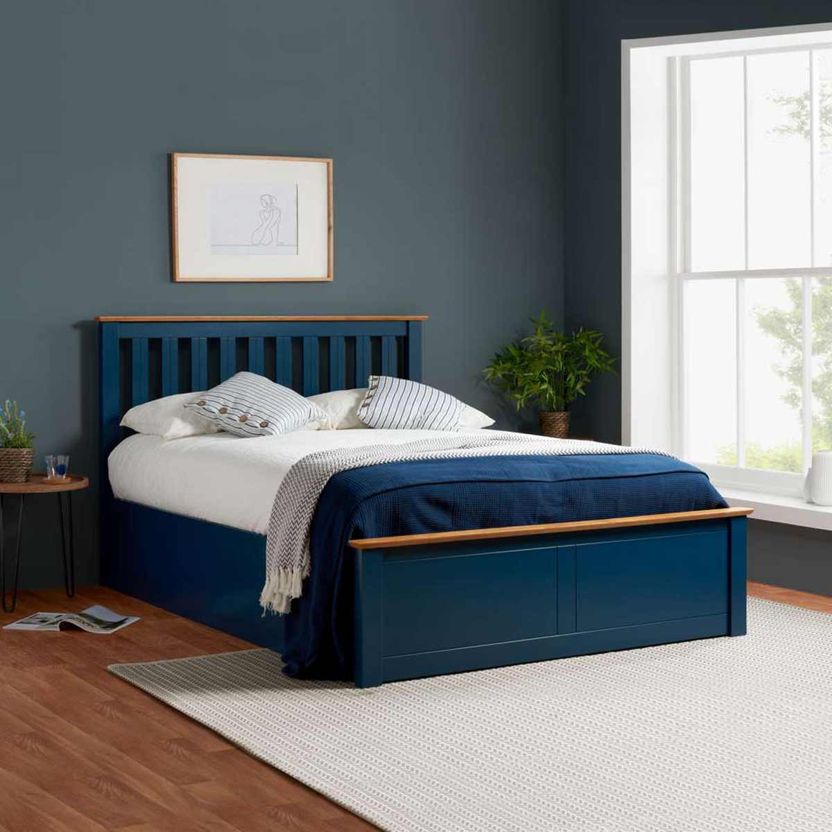 Birlea Phoenix 3FT single bed frame in blue, featuring solid wood construction, slatted headboard, and under-bed storage with a contrasting wooden top.