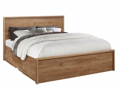Brown double bed with a wooden frame, featuring a high headboard and a low footboard, complemented by white bedding and decorative gray pillows.