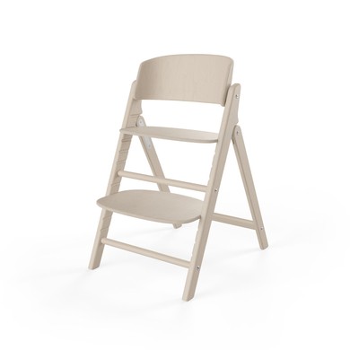 Cybex GOLD Click & Fold high chair in a natural wood finish, featuring a minimalist design with adjustable seat and footrest for growing children.