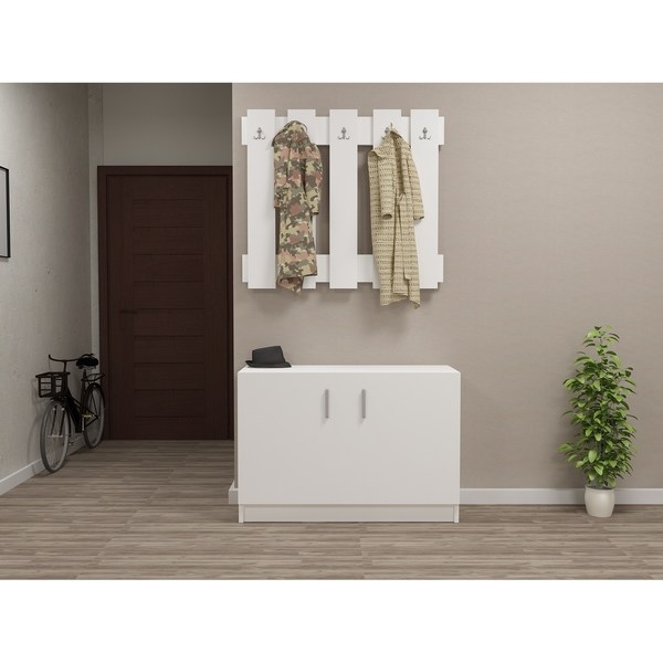 Large white storage cabinet with two doors, set against a neutral wall, featuring hanging hooks for coats and a small potted plant nearby, enhancing the modern living space.