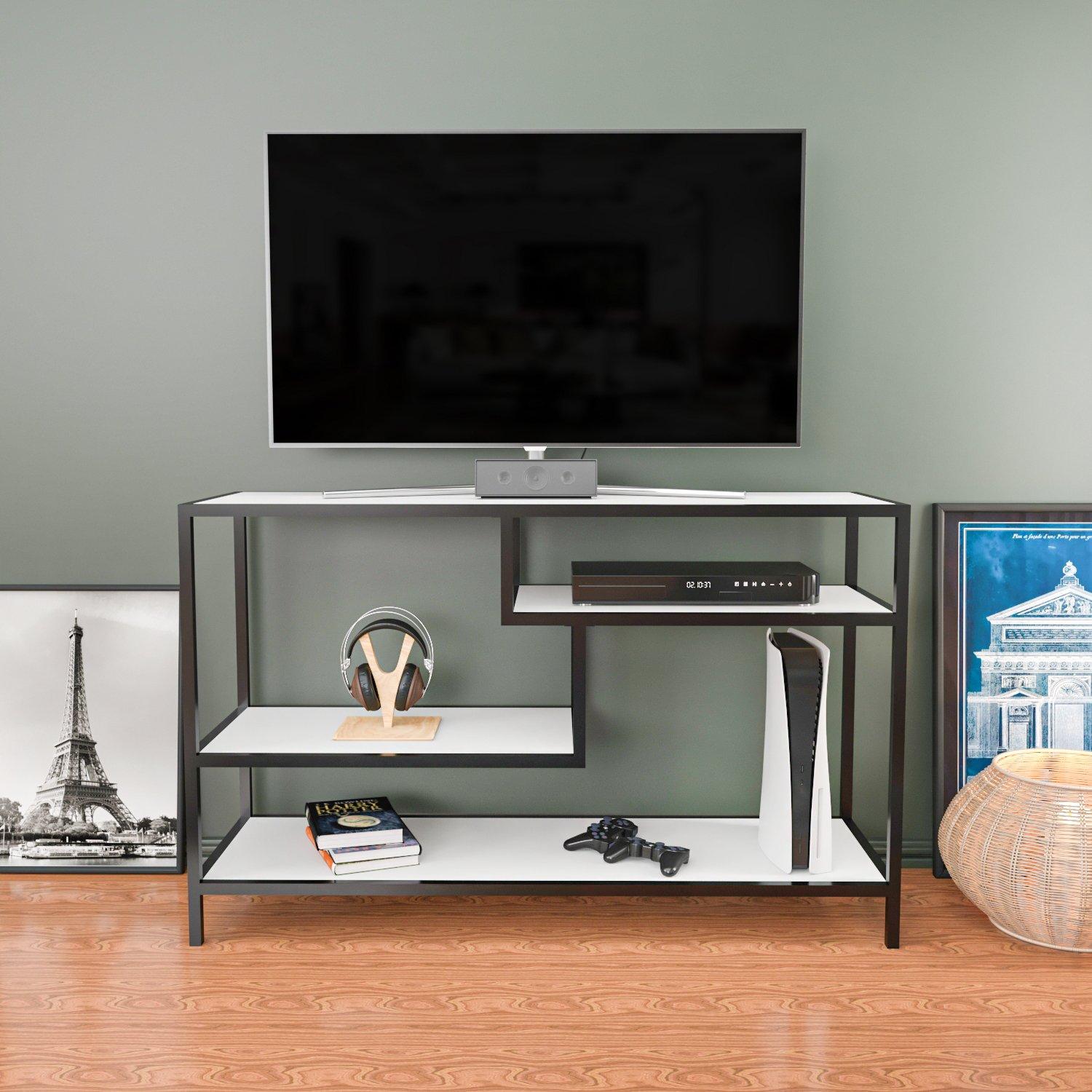 Stylish black and white industrial TV unit featuring open shelves, a metal frame, and a modern design, suitable for media storage and display.