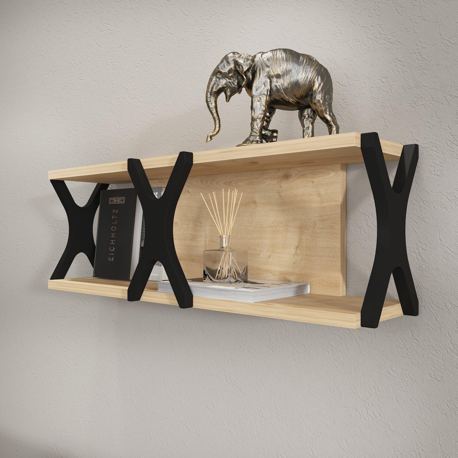 Sapphire oak wall shelf with black X-shaped supports, featuring decorative items like a golden elephant sculpture, a reed diffuser, and stacked books.