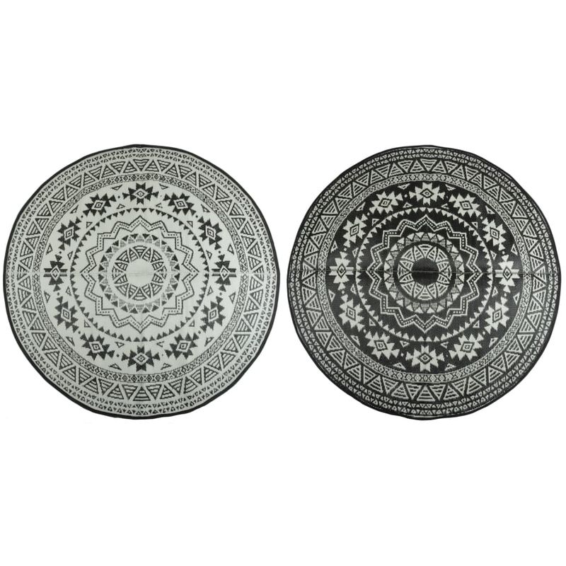 Reversible round garden carpet featuring a black and white geometric pattern, made from durable material, ideal for outdoor use, with intricate designs on both sides.