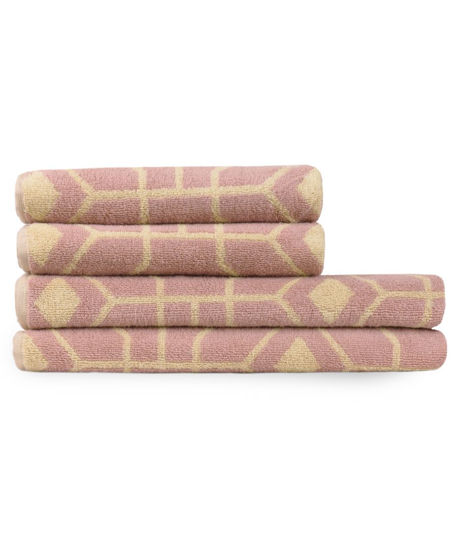 Four soft cotton towels in a geometric jacquard design, featuring a pink base with cream-colored hexagonal patterns and contrasting edges.