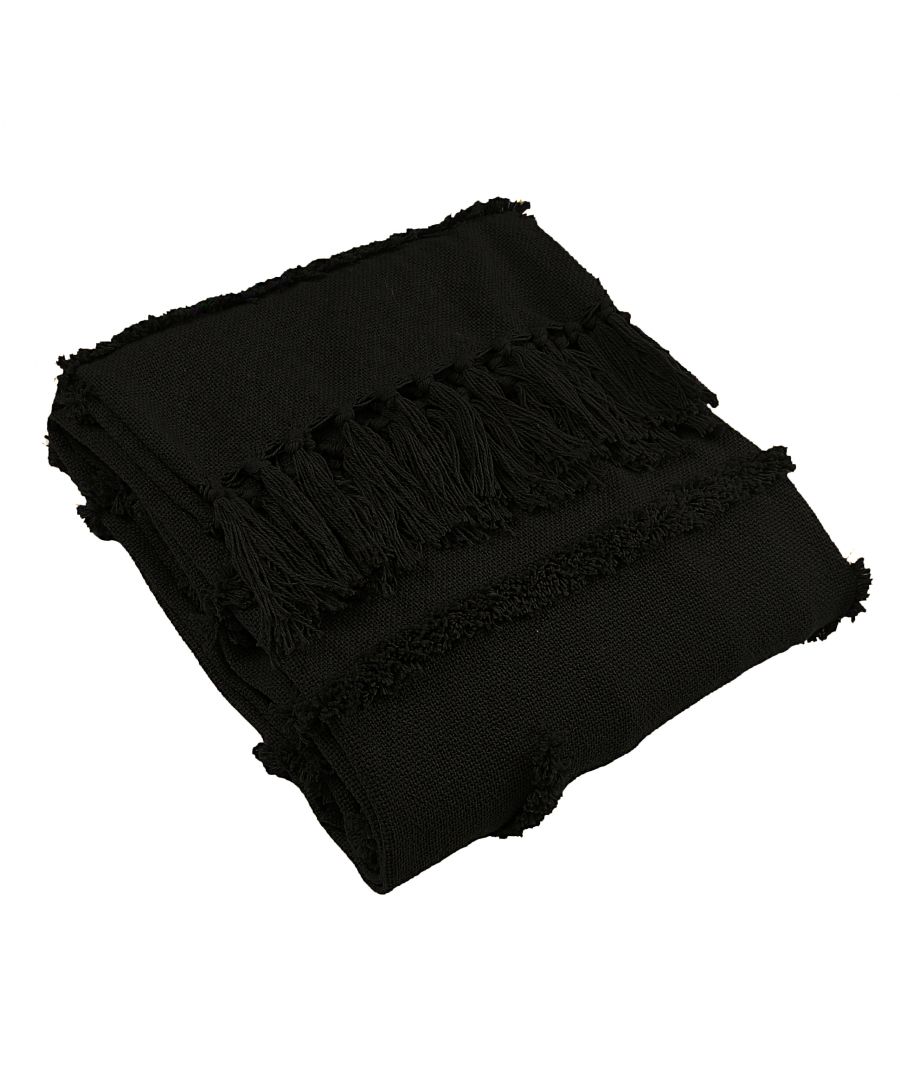Black cotton throw blanket with textured fringed edges, neatly folded, featuring a simple and elegant design suitable for various decor styles.