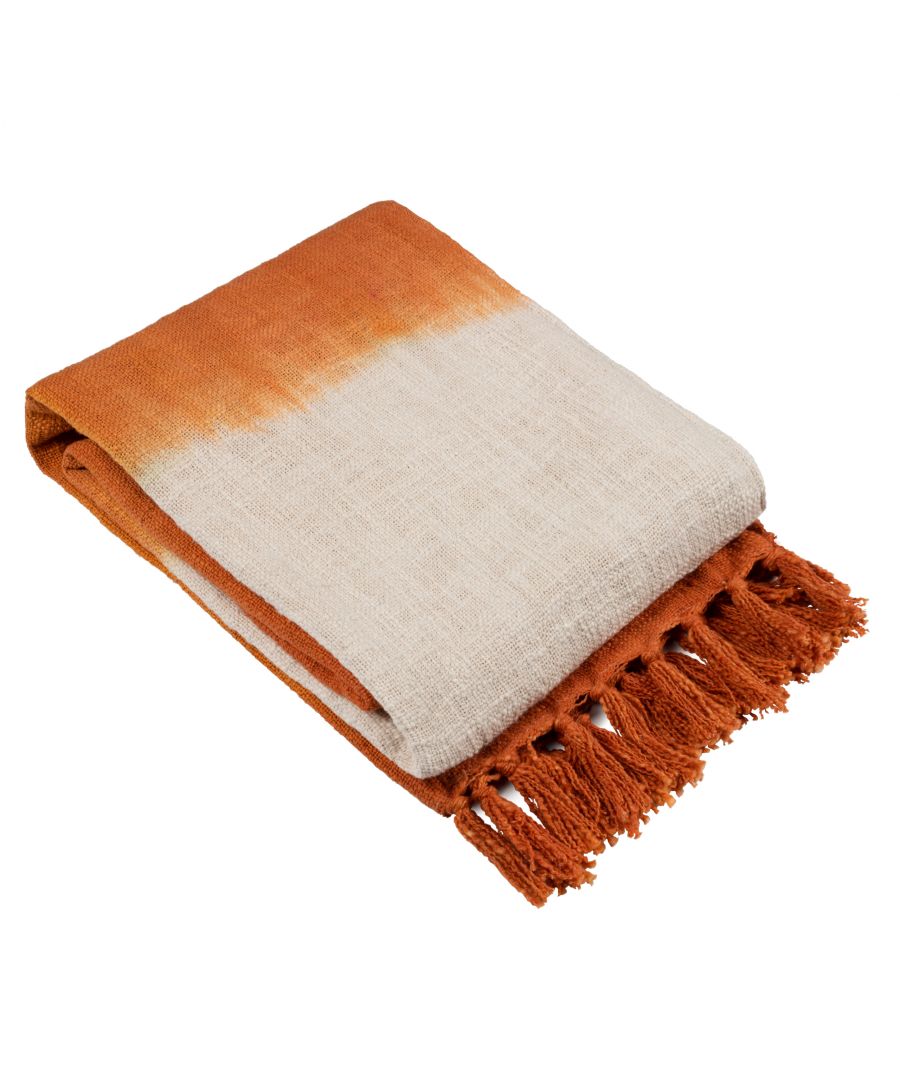 Orange and cream cotton throw blanket featuring a dip dye design with fringed edges, perfect for adding a pop of color to any space.