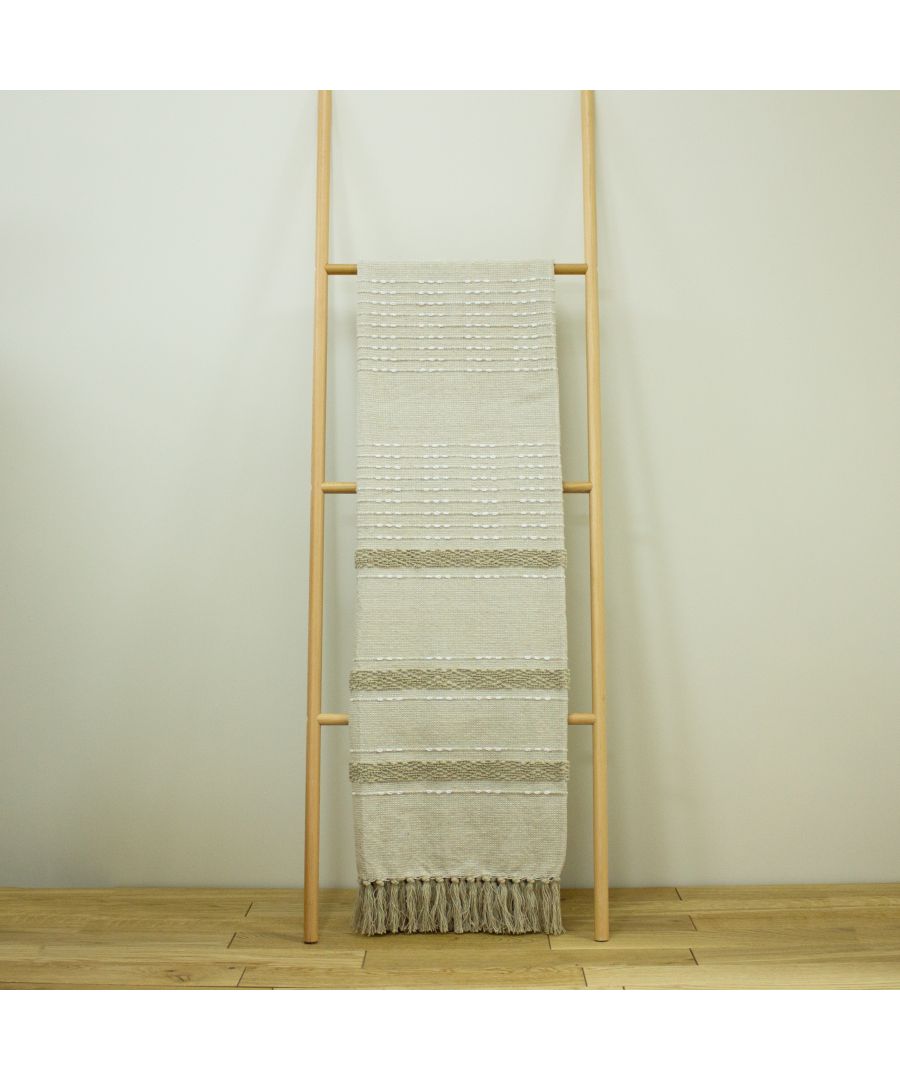 Natural cotton throw measuring 130x180 cm, featuring a textured design with subtle stripes and fringed edges, displayed on a wooden ladder against a neutral background.