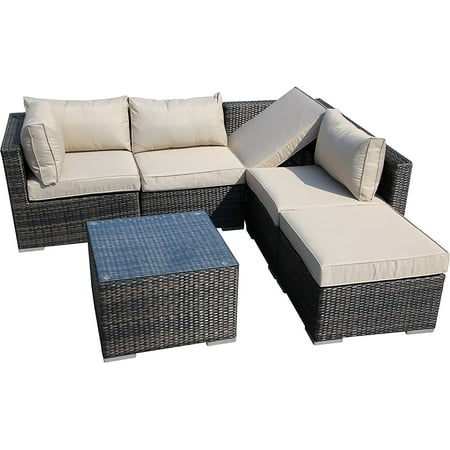Grey rattan garden furniture set featuring a sectional sofa with cream cushions and a square aluminum frame table, designed for six people.