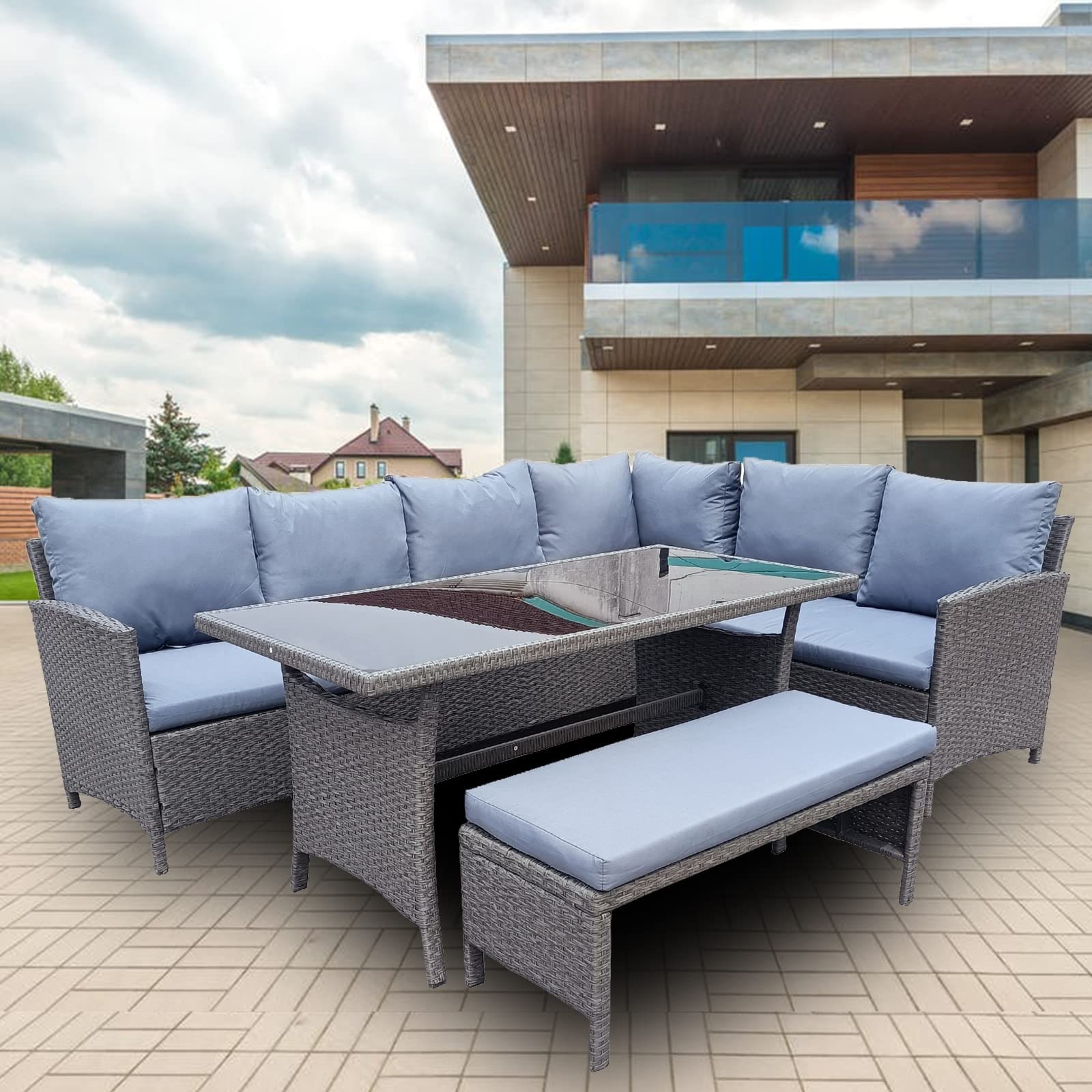 3-piece wicker patio furniture set featuring a tempered glass top table, plush blue cushions, and a swivel design, set against a modern outdoor backdrop.