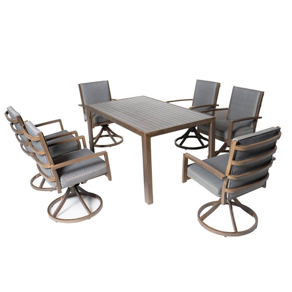 7-piece aluminum patio dining set featuring a 57-inch rectangular table and six swivel chairs with gray cushions and a wood-like finish.