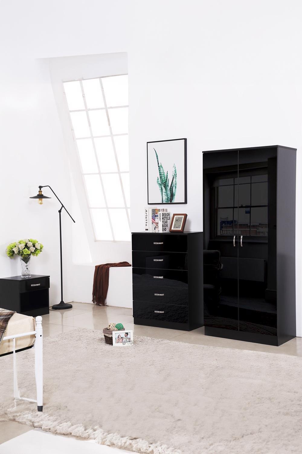 High gloss black double door wardrobe with sleek design, featuring two doors and a modern finish, set against a bright room with a lamp and decorative elements.