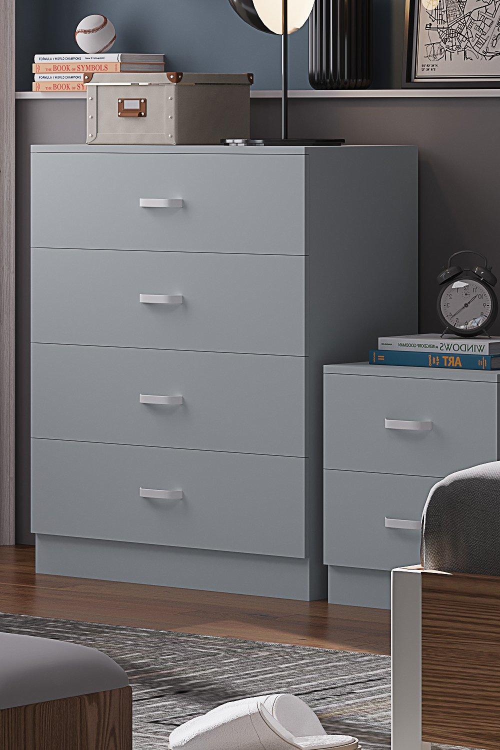 Matt grey four-drawer chest of drawers with sleek handles, featuring a modern design and smooth finish, complemented by a small nightstand in the foreground.