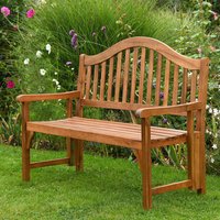 Acacia wood folding bench with curved slatted backrest and armrests, seating for two, set in a garden.