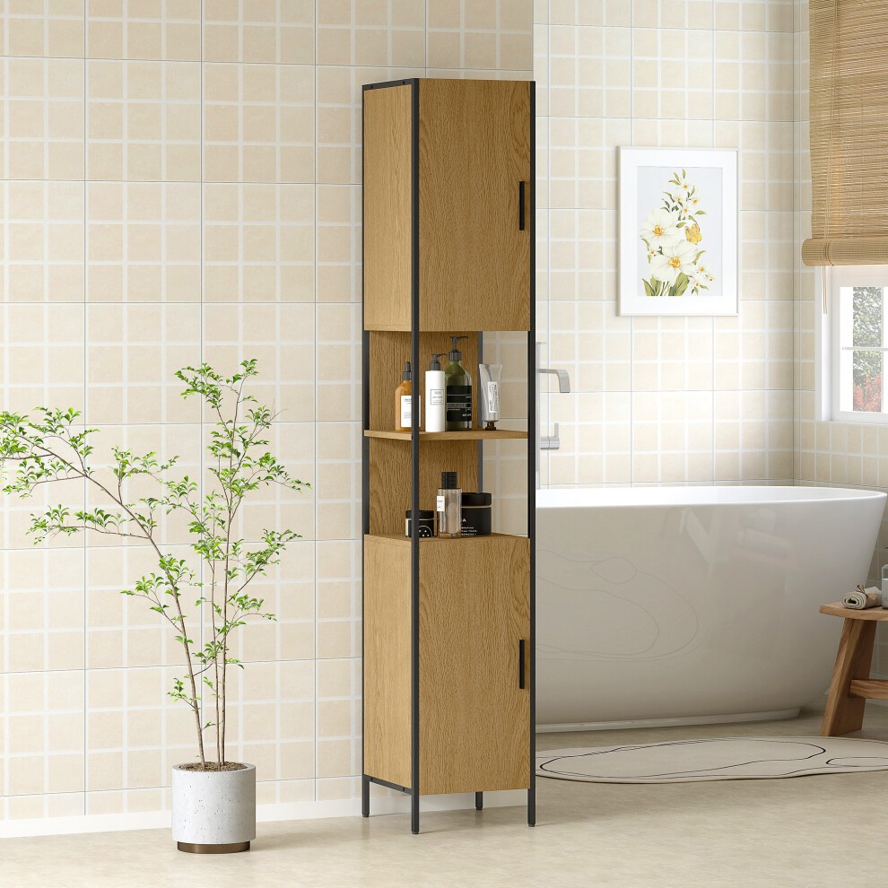 Slim bathroom storage cabinet in natural wood finish with two doors and open compartments, featuring a sleek black metal frame, placed beside a plant in a light, tiled bathroom.