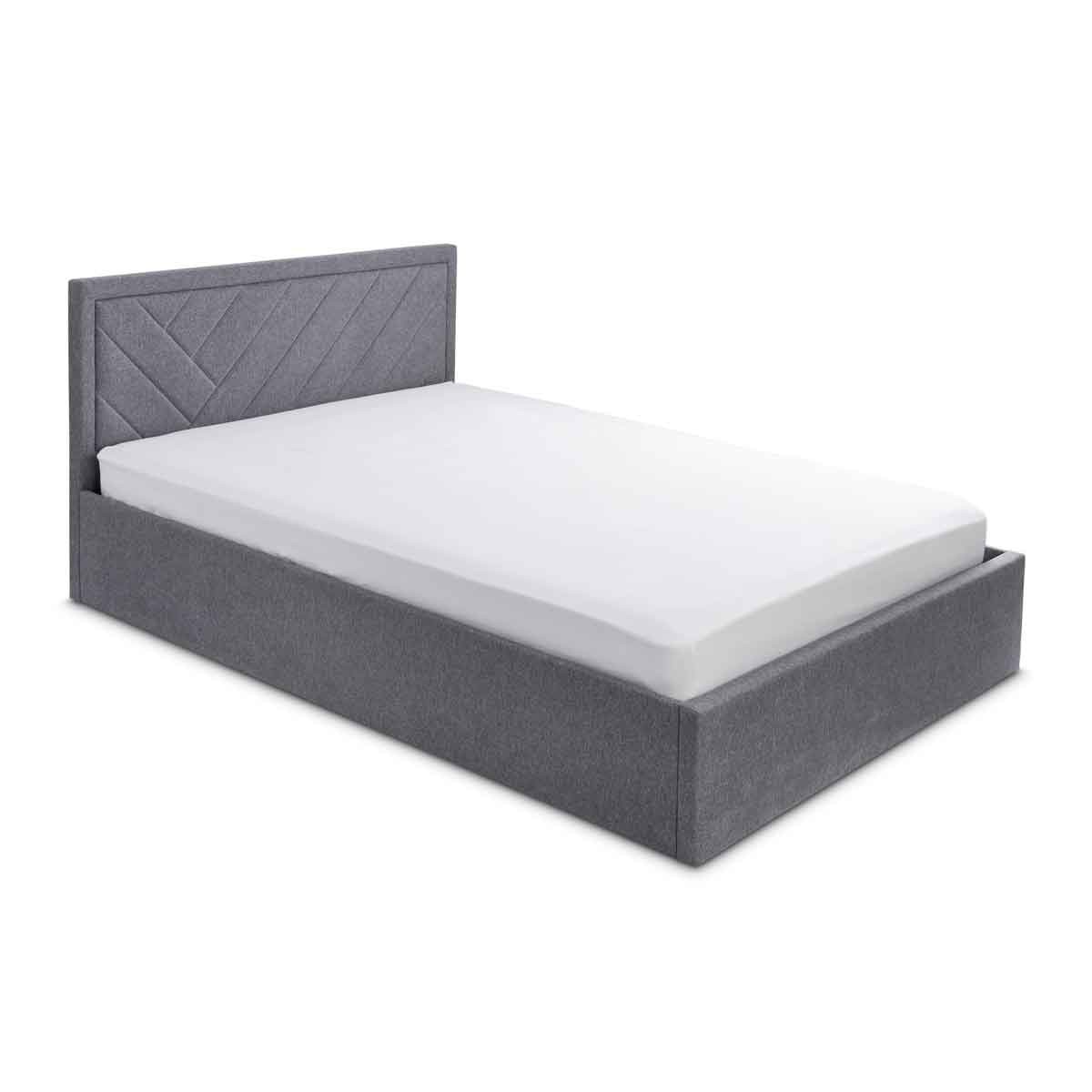 Small double bed in grey fabric featuring a textured chevron-patterned headboard and a low-profile storage base, designed for modern bedrooms.