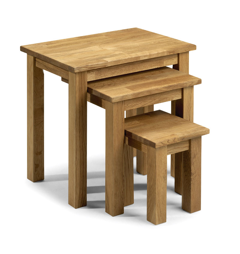 Coxmoor nest of three tables in oak, featuring a natural wood finish, sturdy square legs, and a simple, modern design suitable for various living spaces.