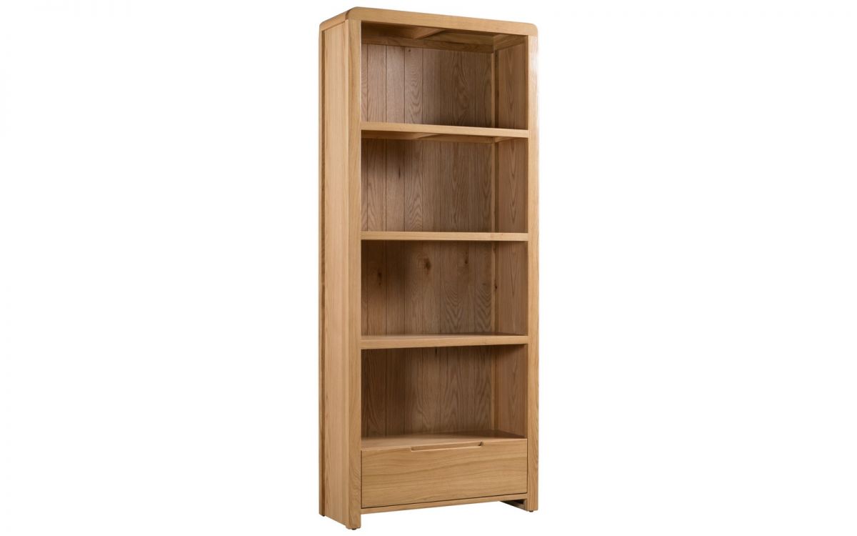 Tall bookcase in light oak finish featuring four open shelves and a bottom drawer, showcasing a sleek, modern design with rounded edges.