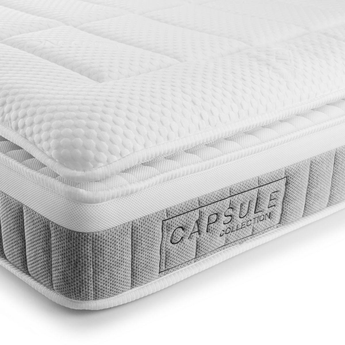 Double Memory Foam Top mattress with a pocket sprung design, featuring a quilted white surface and a grey fabric border, labeled "CAPSULE COLLECTION" by Julian Bowen.