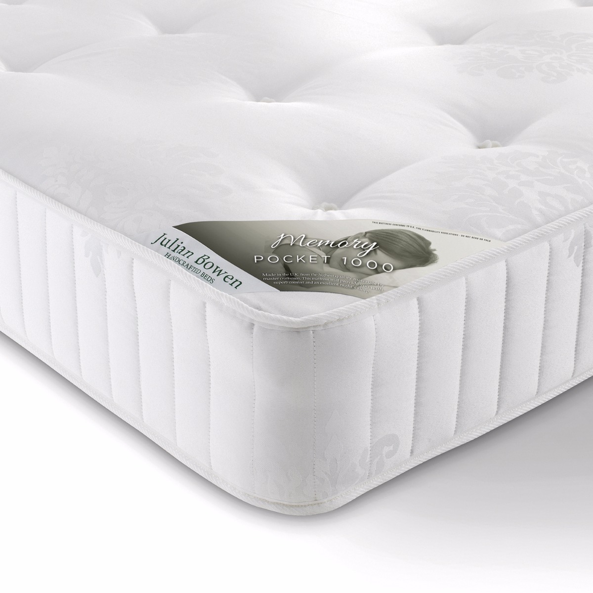 White king-sized mattress with a tufted surface, featuring a label that reads "Julian Bowen Memory Pocket 1000," showcasing a plush, luxurious design and a soft fabric finish.