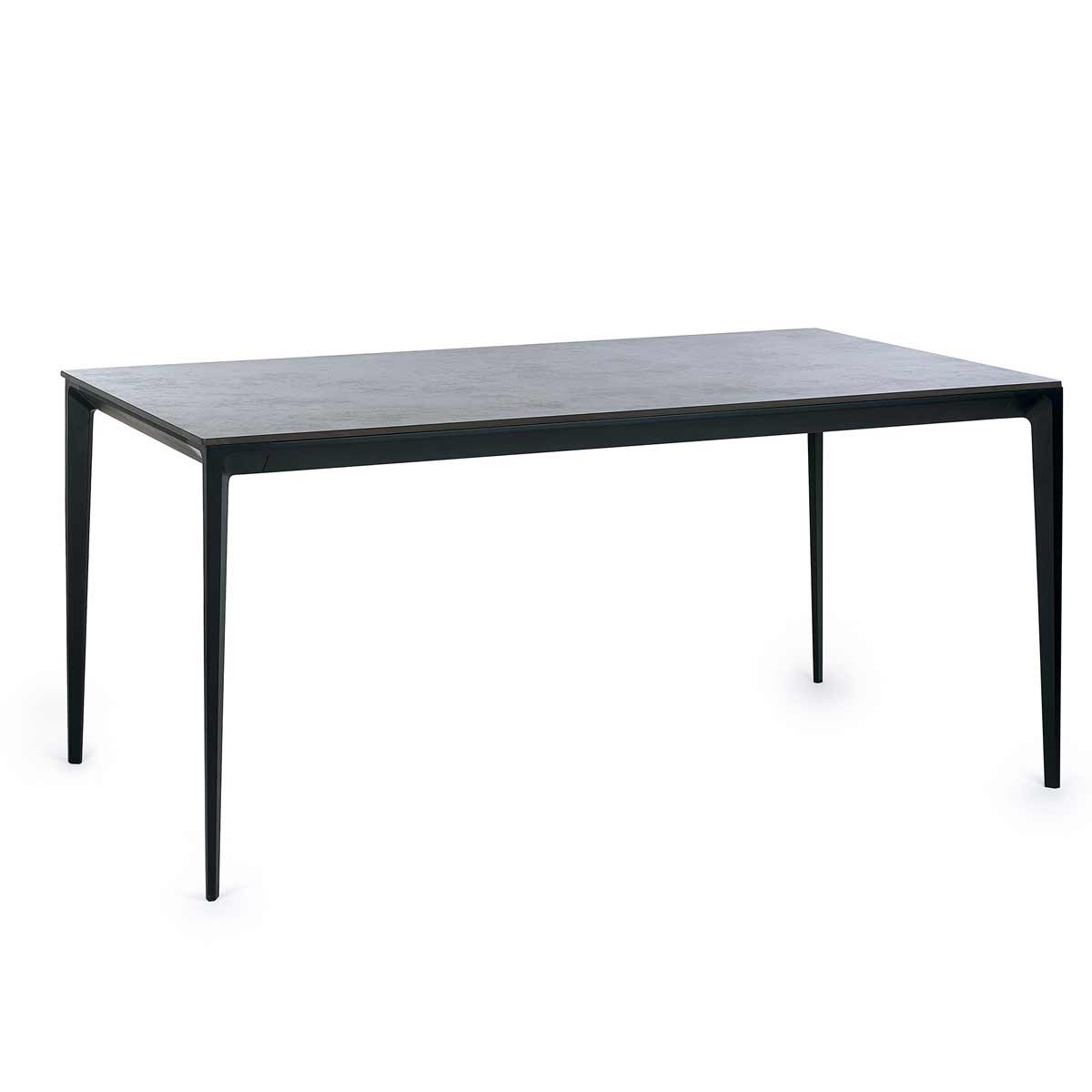 Rectangular dining table with a slate grey stone top and sleek black legs, featuring a modern design suitable for contemporary dining spaces.