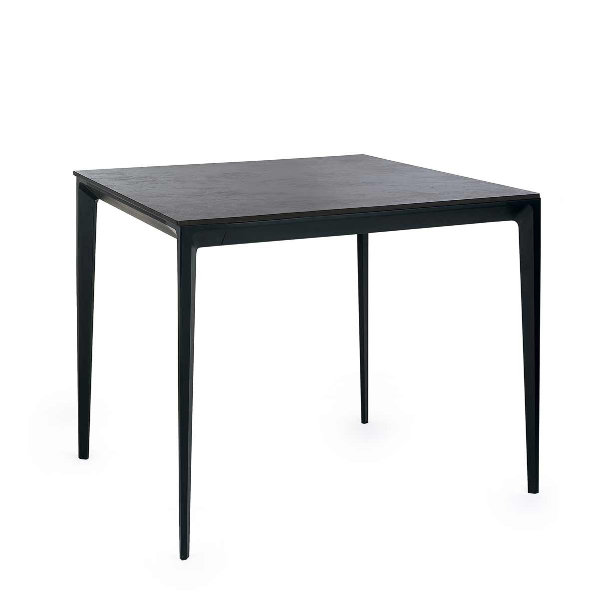 Square dining table with a slate grey stone top and sleek black legs, featuring a modern design suitable for contemporary dining spaces.