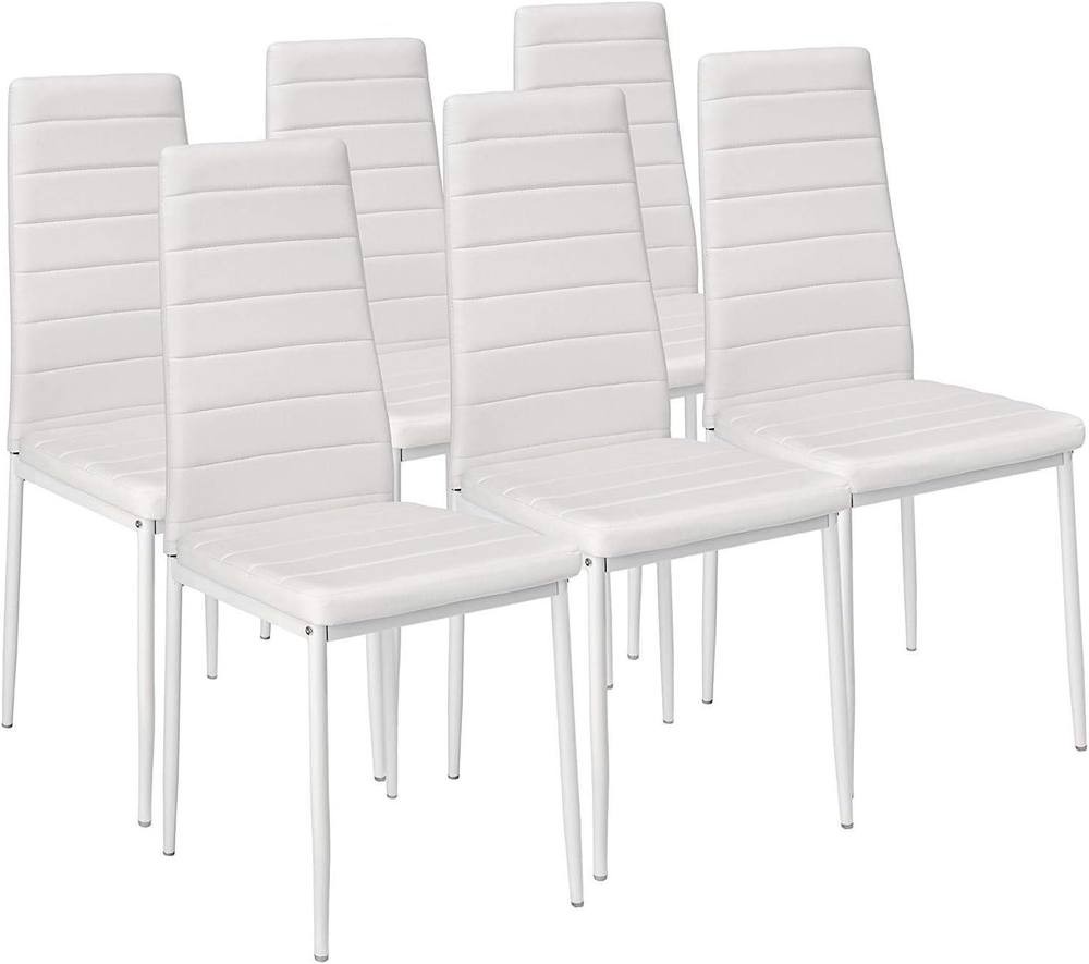 Set of six dining chairs featuring white leather upholstery with vertical stitching, sleek design, and sturdy black metal legs.
