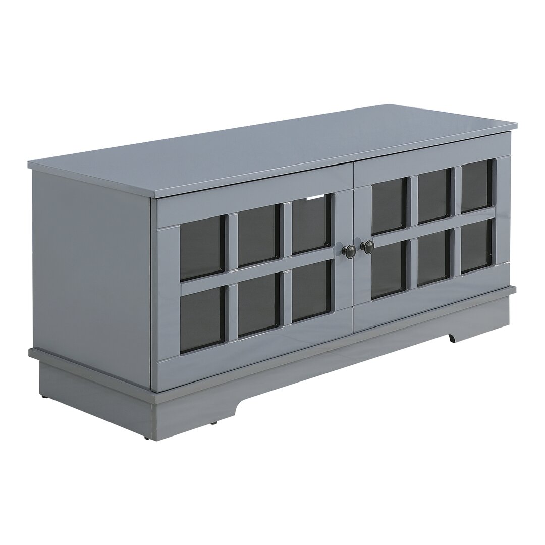 Grey freestanding TV cabinet featuring a classic design, glass-paneled doors, and storage space, suitable for flat screen TVs up to 55 inches.