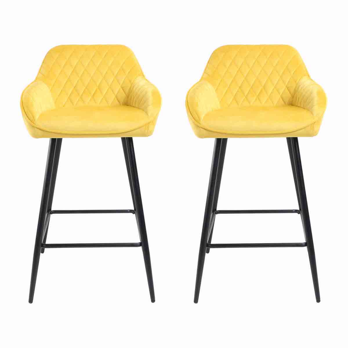 Set of two yellow crushed velvet bar stools with diamond quilted design and black metal legs, featuring comfortable armrests and a sleek modern look.