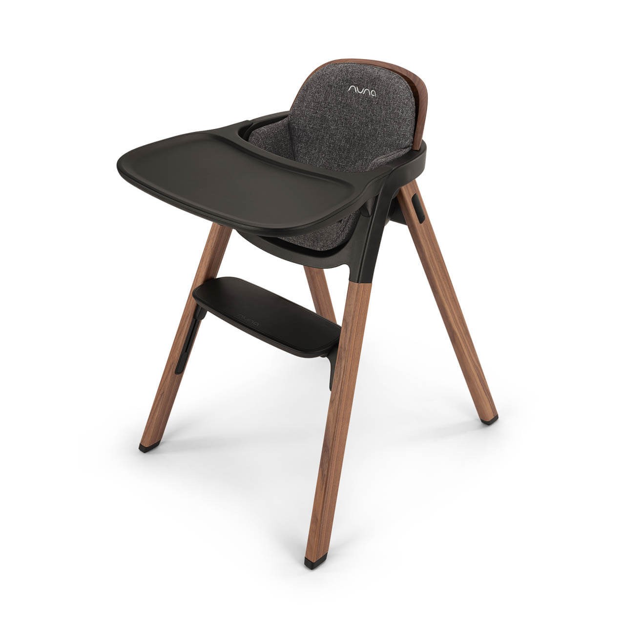 Nuna Bryn Highchair features a sleek black tray, soft gray fabric seat, and sturdy wooden legs, combining modern design with functionality for mealtime.