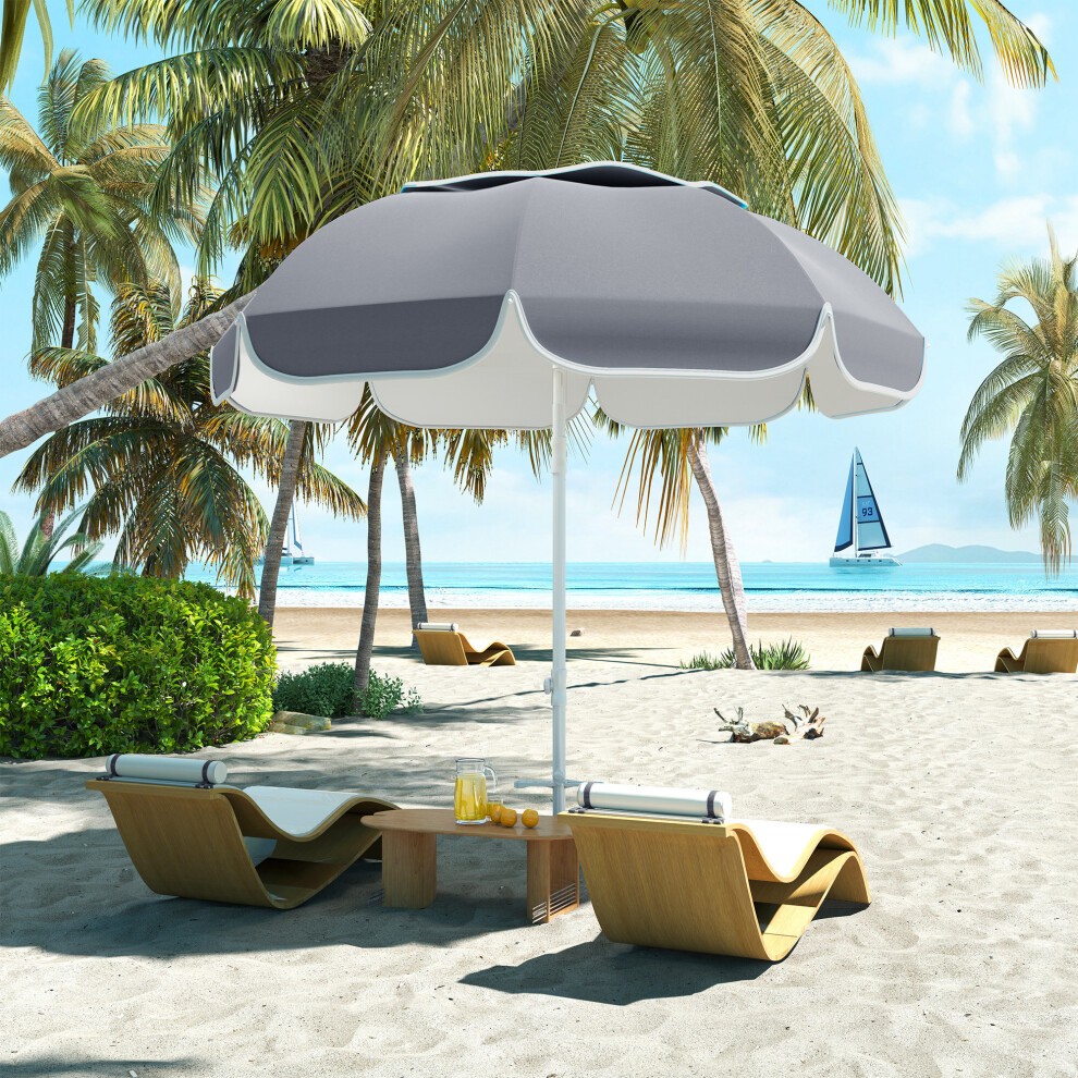 Grey adjustable beach umbrella with a tilt feature, set on a sandy beach, surrounded by palm trees and lounge chairs, providing shade and a stylish outdoor atmosphere.