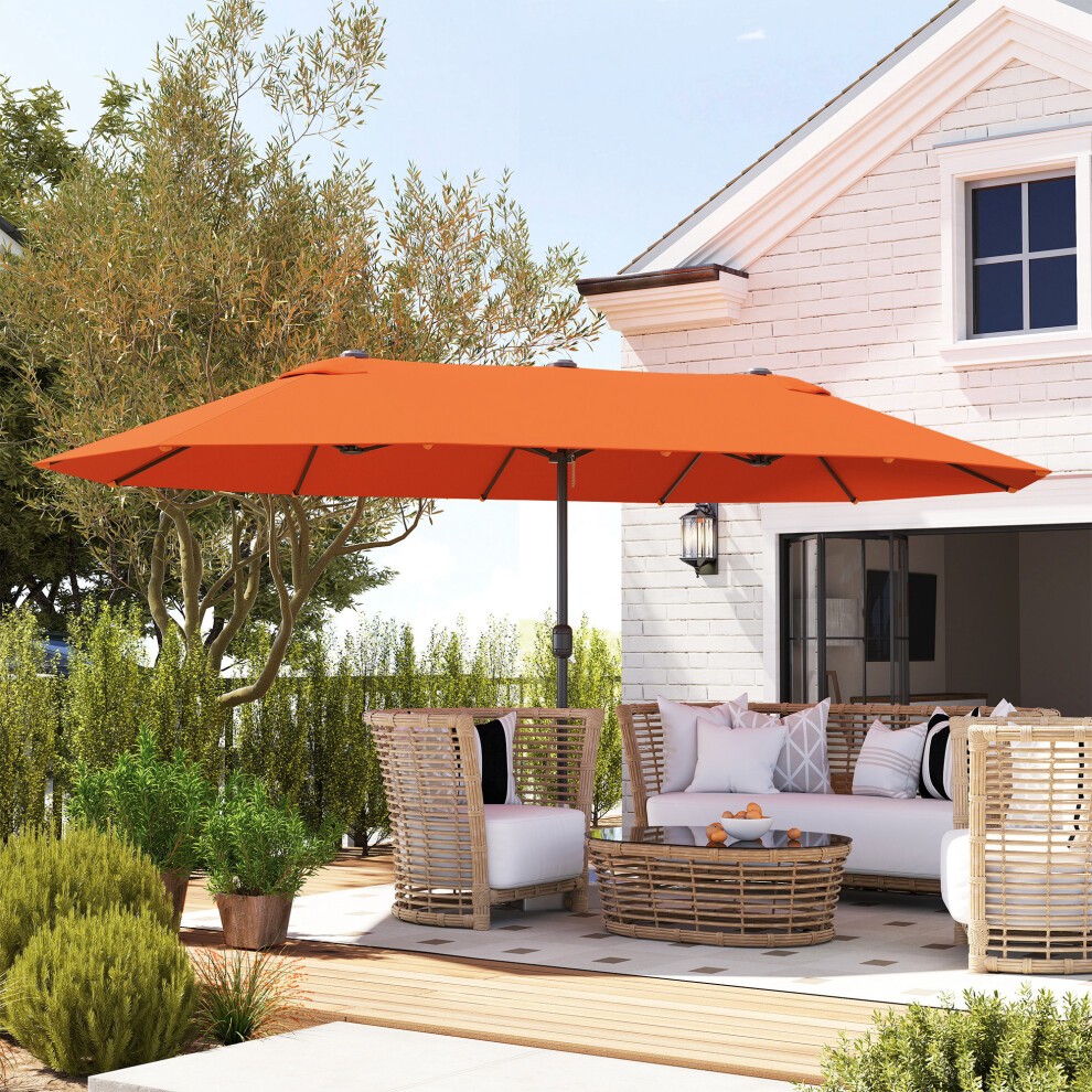 Double-sided crank sun umbrella canopy in vibrant orange, measuring 4.6M, set over a patio with wicker furniture and greenery, providing ample shade.