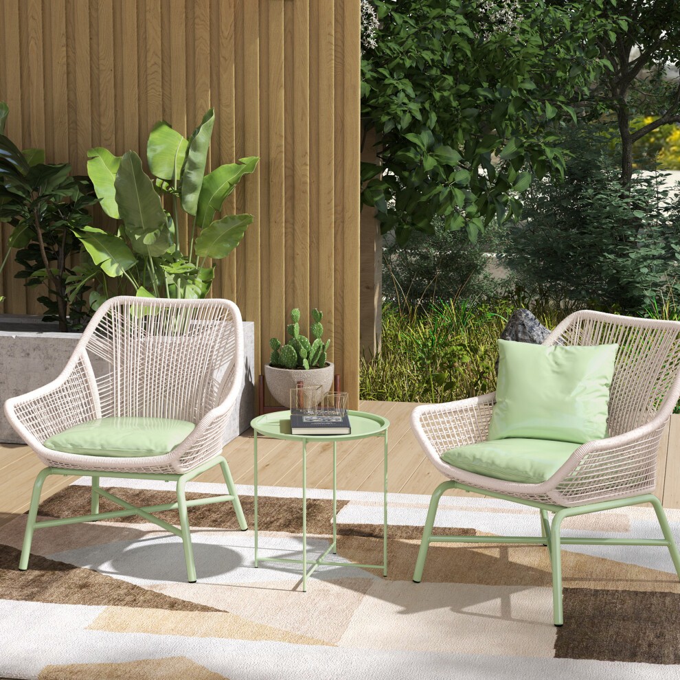 Green 46cm round garden side table with a removable tray, featuring a sleek metal frame, set among two stylish wicker chairs and lush greenery in a cozy outdoor space.
