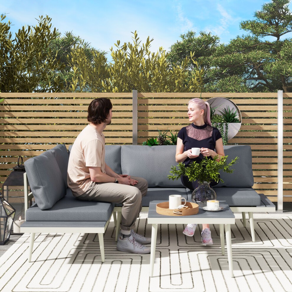 Three-piece grey garden furniture set featuring a 5-level adjustable lounger, modern design with cushioned seating, and a stylish coffee table, set against a lush outdoor backdrop.