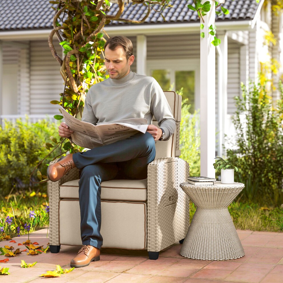 Yellow rattan garden recliner sun lounger with a flip table, featuring a comfortable design, set in a garden environment with greenery and a modern aesthetic.