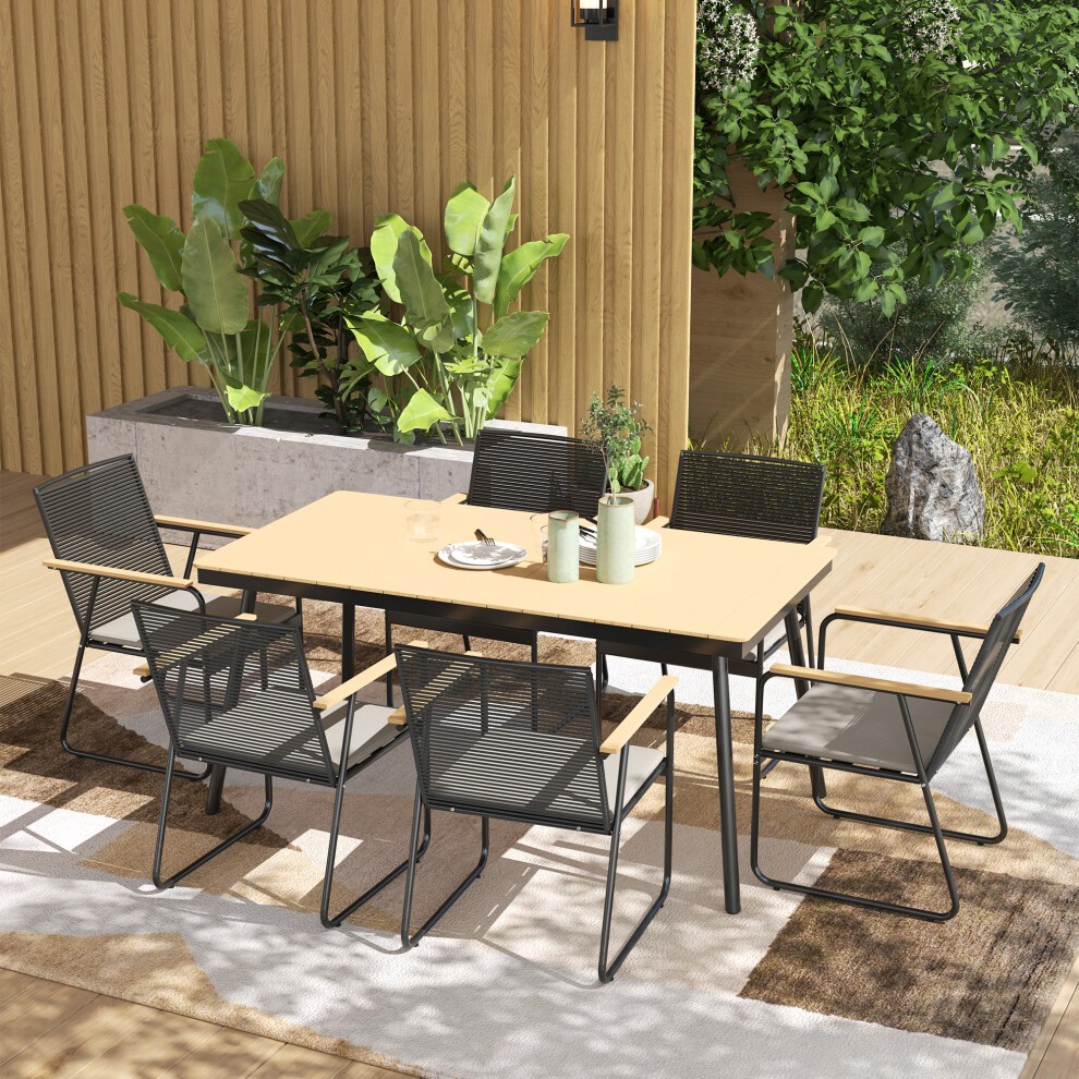 Outsunny 6-seater garden dining set featuring a natural wood tabletop, black metal frame, and cushioned rattan backrests, surrounded by greenery and a modern outdoor setting.