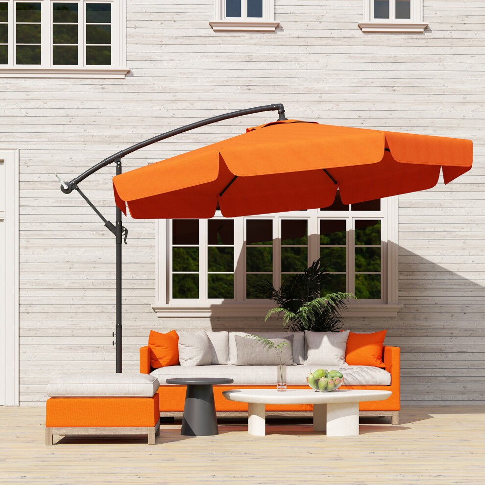 Orange cantilever banana parasol with a crank mechanism, supported by a black metal frame, shading a cozy outdoor seating area with matching orange cushions.