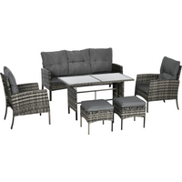 Grey rattan garden furniture set with two armchairs, two footstools, and a table, featuring cushioned seating.