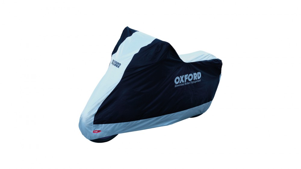 A motorcycle cover in black and light grey, featuring the "OXFORD" logo, designed to protect against weather elements with a streamlined shape and durable material.