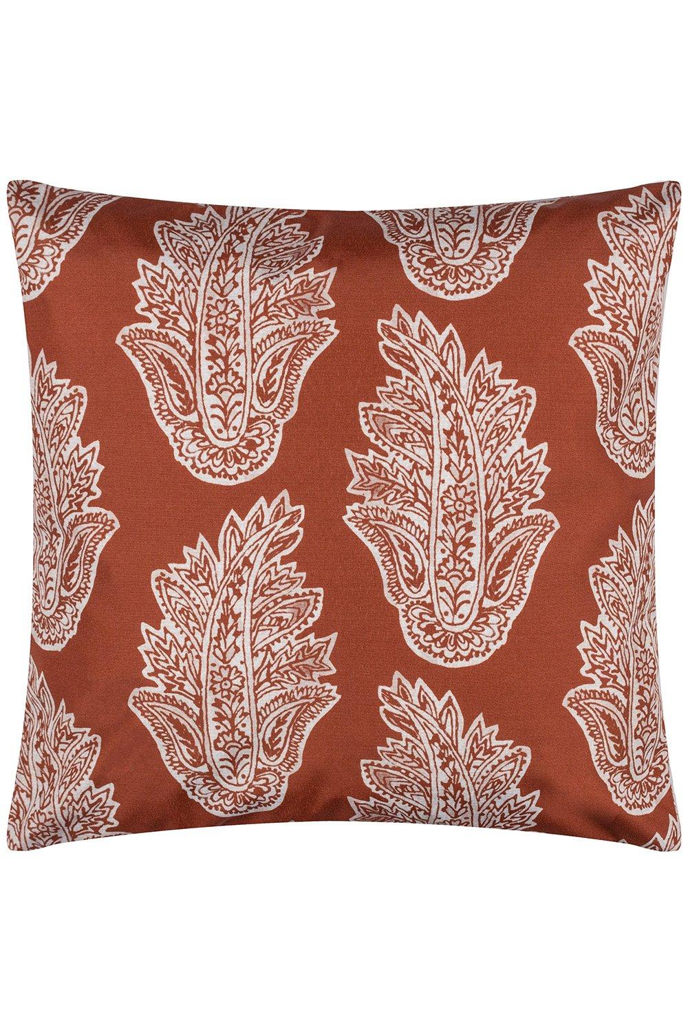 Red paisley-patterned outdoor cushion, 43cm x 43cm, made from water and UV resistant material, featuring a reversible design with intricate white floral motifs.