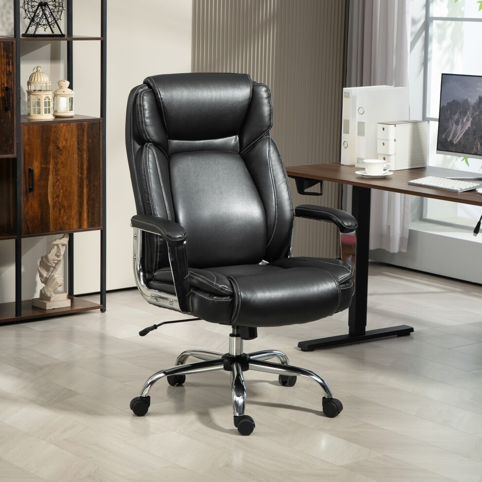 Black faux leather desk chair with adjustable height, chrome base, padded armrests, and a high back, designed to support up to 227 kg (500 lbs) in a modern office setting.