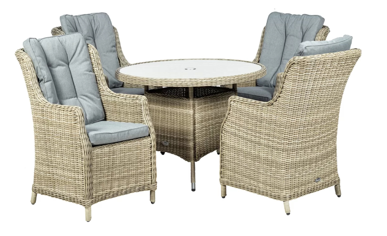 Cream-colored woven rattan dining set with a round table and four highback chairs, featuring plush gray cushions for comfort.