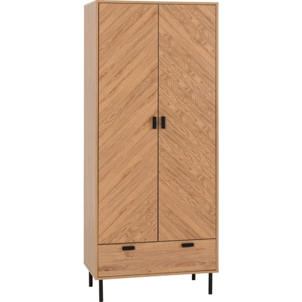Medium oak effect wardrobe featuring a chevron pattern, two doors, a single drawer at the bottom, and black metal handles and legs.